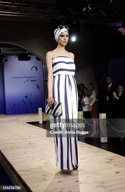 Model walks the runway during the Guido Maria Kretschmer For eBay Collection Launch at Label 2 on April 10, 2013 in Berlin, Germany.