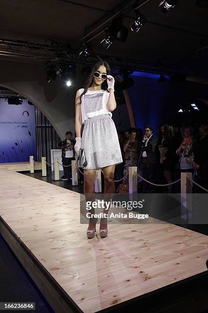 Model walks the runway during the Guido Maria Kretschmer For eBay Collection Launch at Label 2 on April 10, 2013 in Berlin, Germany.