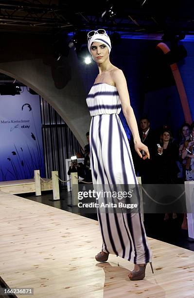 Model walks the runway during the Guido Maria Kretschmer For eBay Collection Launch at Label 2 on April 10, 2013 in Berlin, Germany.