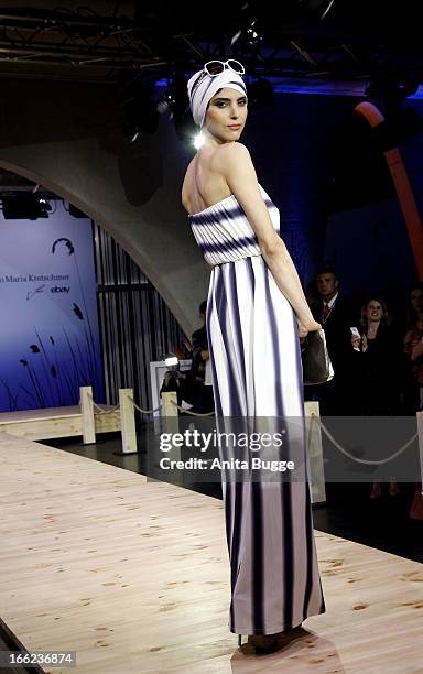 Model walks the runway during the Guido Maria Kretschmer For eBay Collection Launch at Label 2 on April 10, 2013 in Berlin, Germany.