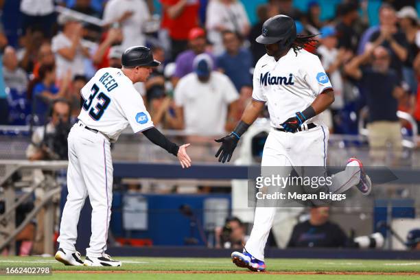 Josh Bell of the Miami Marlins rounds the bases on his two-run home run against the Los Angeles Dodgers in the fifth inning at loanDepot park on...
