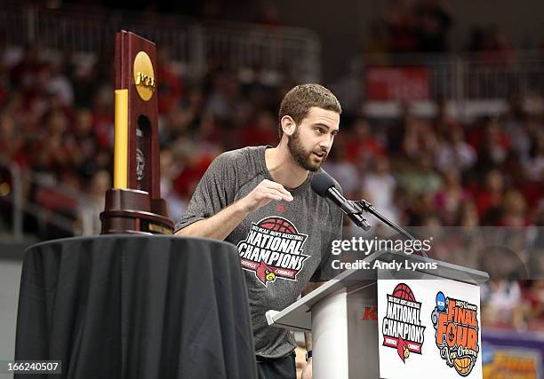 Luke Hancock of the Louisville Cardinals talks during the Louisville Cardinals NCAA Basketball Celebration to mark the NCAA championship by the Mens...