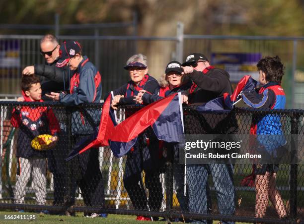 Fans are seen during a Melbourne Demons AFL training session at Gosch's Paddock on September 06, 2023 in Melbourne, Australia.