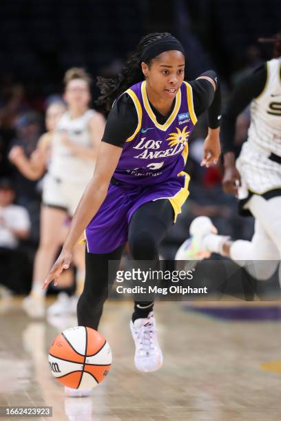Guard Jordin Canada of the Los Angeles Sparks handles the ball in the first half against the Chicago Sky at Crypto.com Arena on August 29, 2023 in...