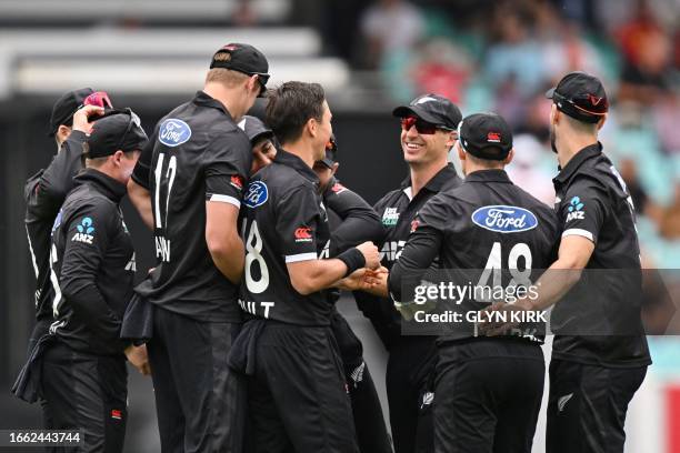 New Zealand's players celebrate after taking the wicket of England's Jonny Bairstow during the third One Day International cricket match between...