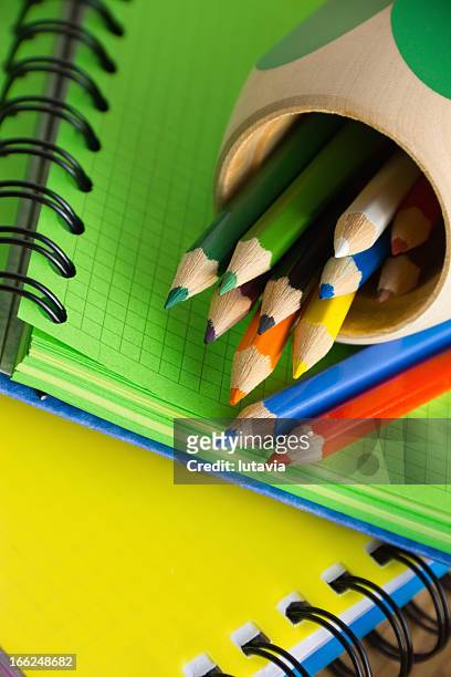 notebooks and pencil-case with colored pencils - workbook stock pictures, royalty-free photos & images