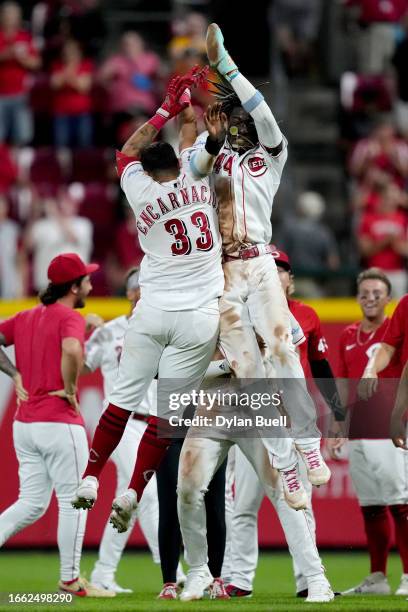 Christian Encarnacion-Strand and Elly De La Cruz of the Cincinnati Reds celebrate after Encarnacion-Strand hit a walk-off single in the ninth inning...