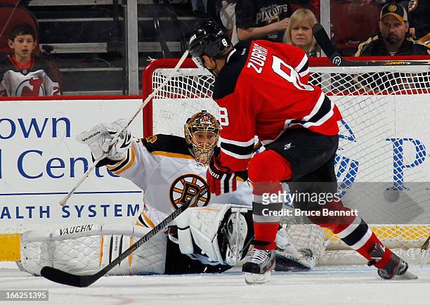 Anton Khudobin of the Boston Bruins gets in position to make the save on Dainius Zubrus of the New Jersey Devils at the Prudential Center on April...