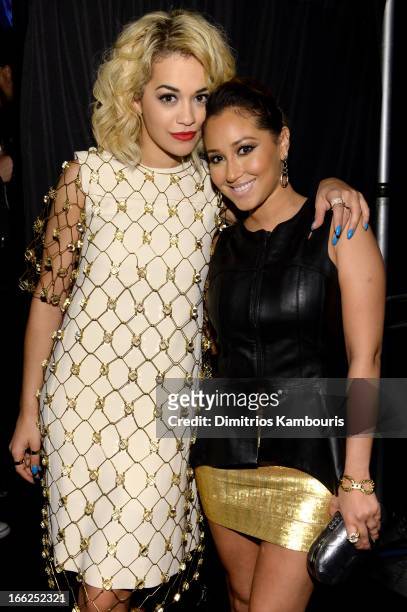 Singer Rita Ora and Adrienne Bailon attend the 4th Annual ELLE Women in Music Celebration at The Edison Ballroom on April 10, 2013 in New York City.