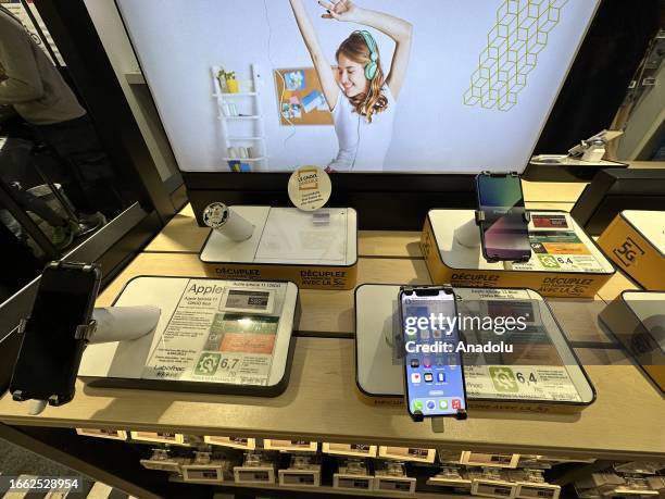 View of Apple's store after the sale of iPhone 12 model phones is banned in Paris, France on September 13, 2023. The sales of the iPhone 12 model...