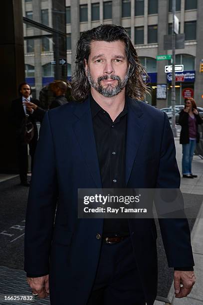 Actor Ron Moore leaves his Soho hotel on April 10, 2013 in New York City.