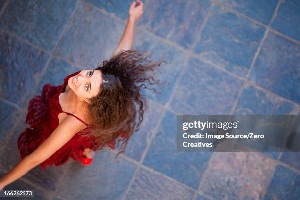 woman in gown spinning outdoors - person look up from above stock pictures, royalty-free photos & images