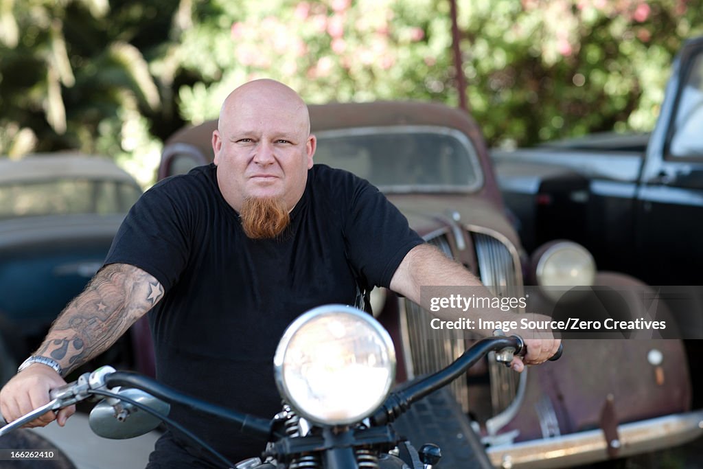Man sitting on motorcycle