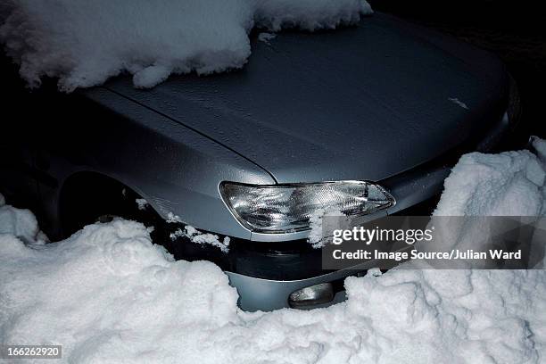 car buried in snow - la clusaz stock pictures, royalty-free photos & images