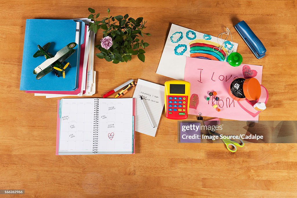 Child's notebooks, pens and toys