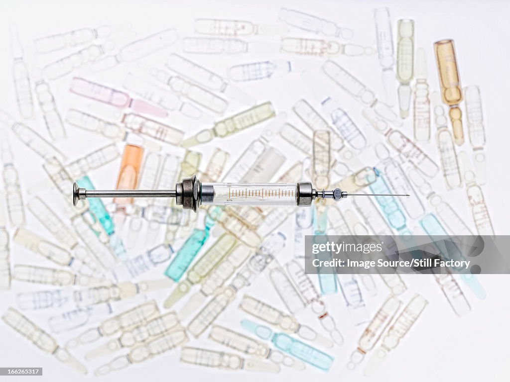 Close up of syringe and vials