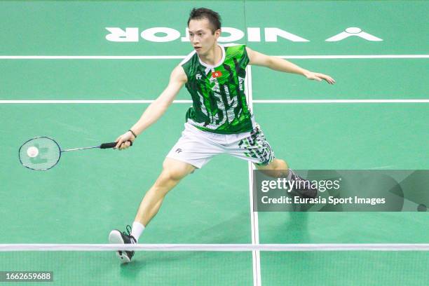 Ng Ka Long Angus of Hong Kong competes in the Men's Single match against Jonatan Christie of Indonesia during day two of the Victor Hong Kong Open at...