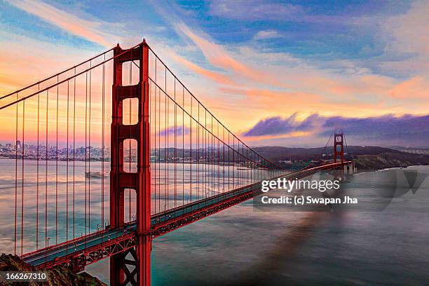 golden gate sunset - golden gate bridge stock pictures, royalty-free photos & images