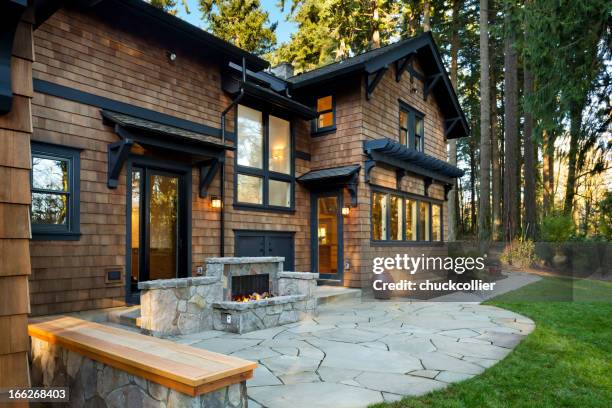 back patio and fireplace - luxury home exterior stockfoto's en -beelden