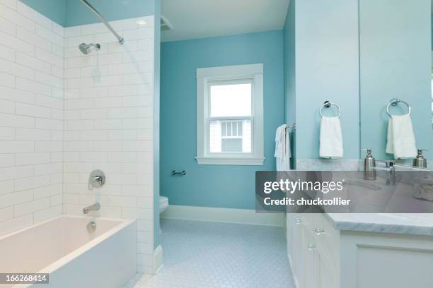 blue bathroom - new bathtub stock pictures, royalty-free photos & images