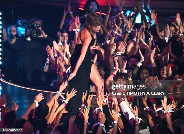 Singer-songwriter Taylor Swift greets fans during the MTV Video Music Awards at the Prudential Center in Newark, New Jersey, on September 12, 2023.