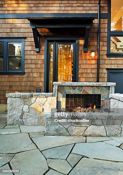 outdoor fireplace - stone patio stock pictures, royalty-free photos & images