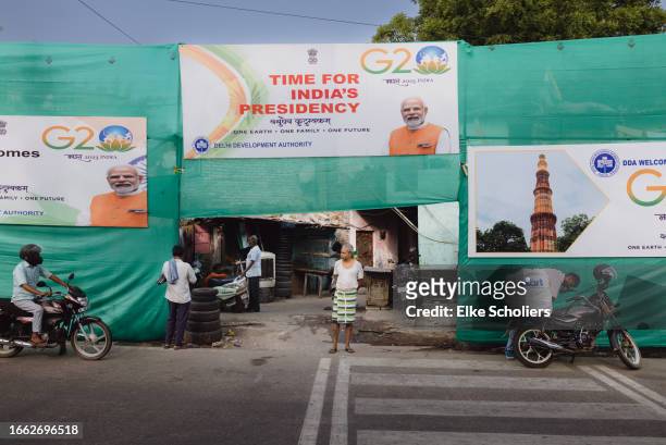 Slum area is covered up as part of a beautification project on September 06, 2023 in New Delhi, India. The 18th G20 Summit will take place September...