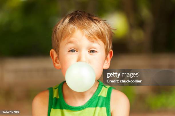blowing bubble - bubble gum stock pictures, royalty-free photos & images