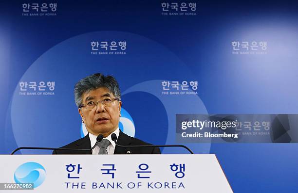 Kim Choong Soo, governor of the Bank of Korea, speaks during a news conference following a monetary policy meeting at the central bank's headquarters...