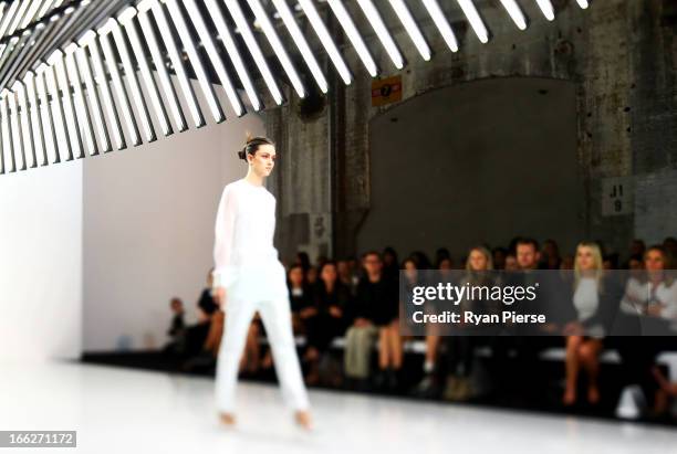 Model showcases designs on the runway at the Bec and Bridge show during Mercedes-Benz Fashion Week Australia Spring/Summer 2013/14 at Carriageworks...