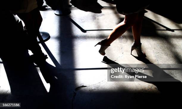 Crowd walk through the foyer during Mercedes-Benz Fashion Week Australia Spring/Summer 2013/14 at Carriageworks on April 8, 2013 in Sydney, Australia.