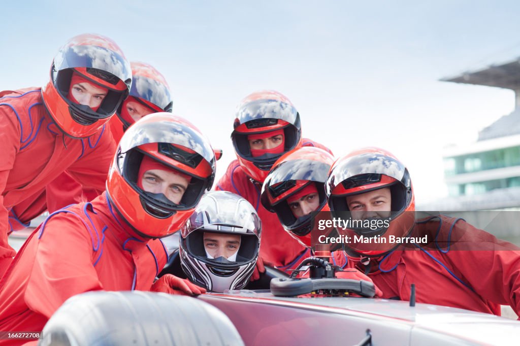 Race car team at pit stop