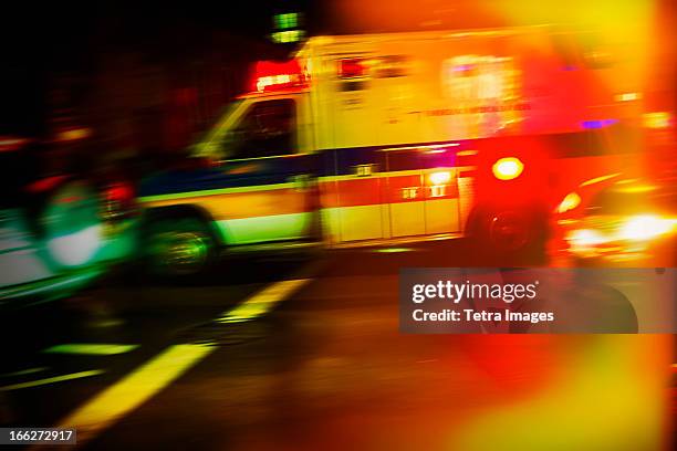 usa, new york city, ambulance at night - ambulance lights stock pictures, royalty-free photos & images