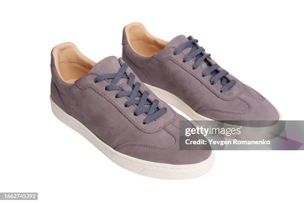 suede sneakers shoes on white background - suede boot stock pictures, royalty-free photos & images