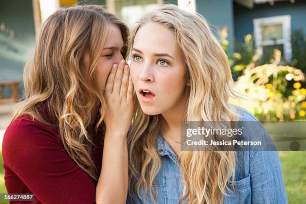 usa, utah, provo, two friends gossiping - rumor stockfoto's en -beelden