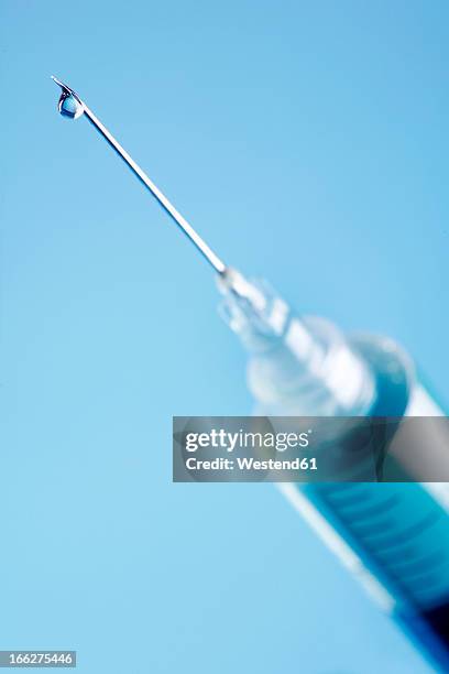 Syringe Droplet Photos and Premium High Res Pictures - Getty Images