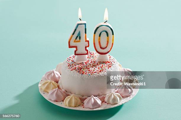 birthday cake with burning candles - 40 birthday foto e immagini stock