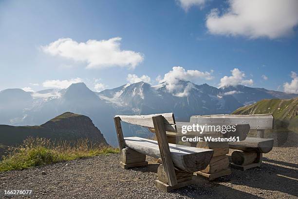 austria, großglockner, high alpine road, picnic area - holzbank stock-fotos und bilder