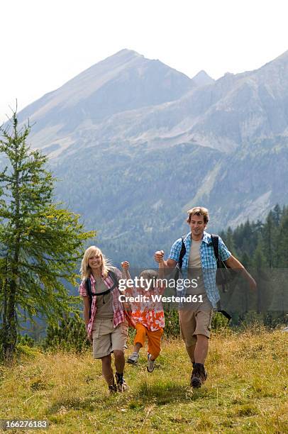 austria, salzburger land, couple with son (8-9) hiking - central europe stock pictures, royalty-free photos & images