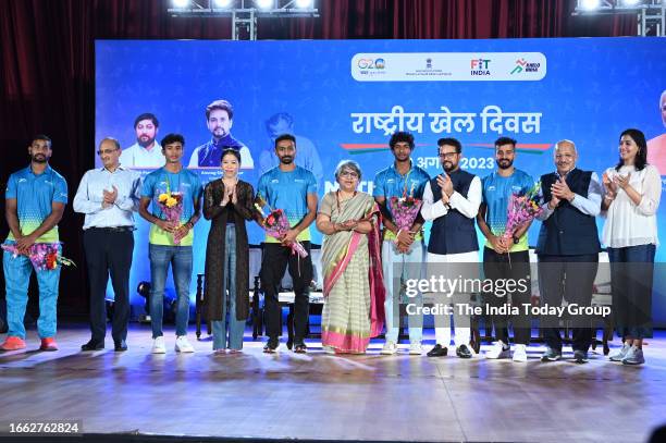 New Delhi, India – August 29: Union Minister for Youth Affairs and Sports Anurag Thakur with sports secretary Sujata Chaturvedi and boxer Mary Kom,...