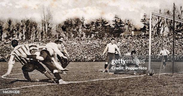 Sheffield United goalkeeper William 'Fatty' Foulke is relieved to see the ball go narrowly wide of his goal during the English FA Cup Final between...