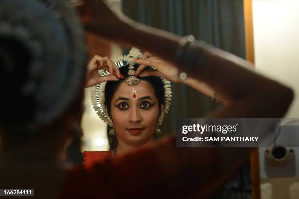 Indian Odissi dancer, Dhara Gandhi prepares for her performance for the 'Celebrating the World of Dance' festival at Natarani Amphitheatre in...