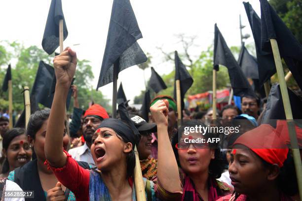 Bangladeshi demonstrators rally with black flags as they oppose an ongoing nationwide strike called by the student wing of Bangladesh Jumaat-e-Islami...