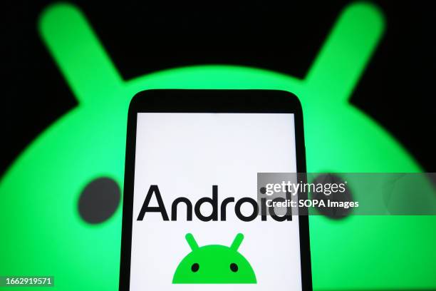 In this photo illustration, a new Android logo is seen on a smartphone screen.