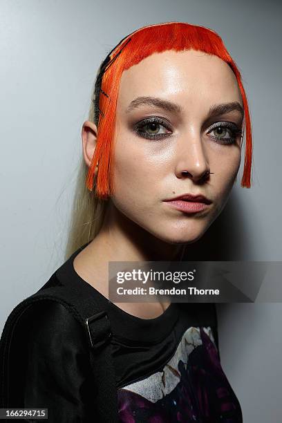 Model poses backstage ahead of the Emma Mulholland show during Mercedes-Benz Fashion Week Australia Spring/Summer 2013/14 at Carriageworks on April...