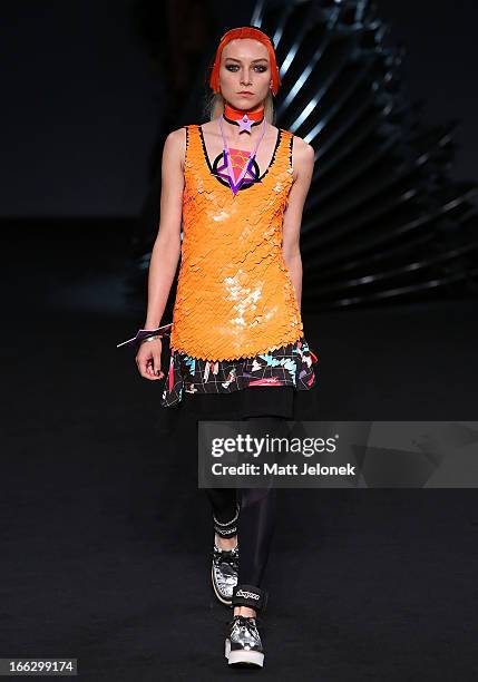 Model showcases designs on the runway at the Emma Mulholland show during Mercedes-Benz Fashion Week Australia Spring/Summer 2013/14 at Carriageworks...