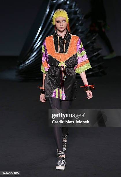 Model showcases designs on the runway at the Emma Mulholland show during Mercedes-Benz Fashion Week Australia Spring/Summer 2013/14 at Carriageworks...