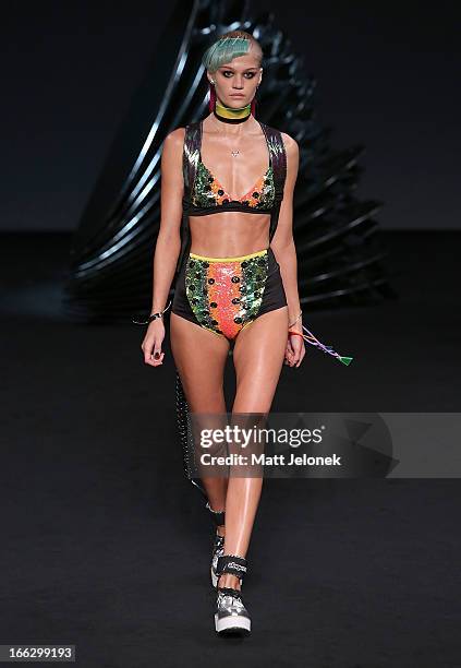 Model showcases designs on the runway at the Emma Mulholland show during Mercedes-Benz Fashion Week Australia Spring/Summer 2013/14 at Carriageworks...