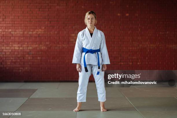 strong attitude - woman judo stock pictures, royalty-free photos & images