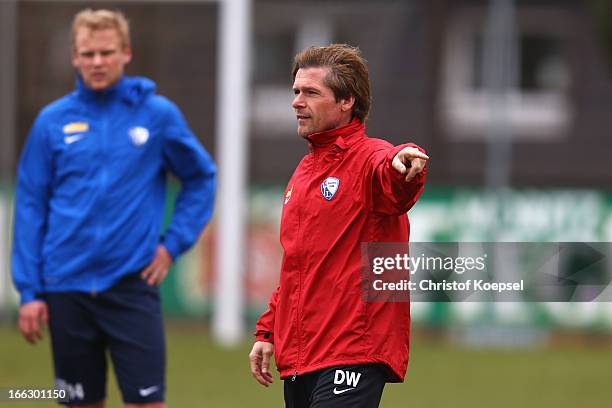 Assistant coach Dariusz Wosz issues instructions during a training session of VfL Bochum at Castroper Strasse training ground on April 11, 2013 in...